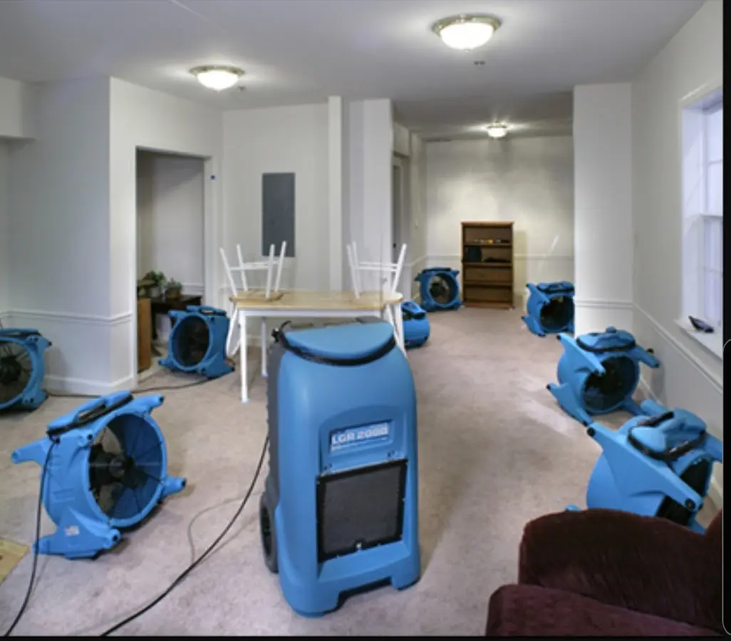 Air movers and dehumidifier setup for Water Extraction & Removal in Quincy
